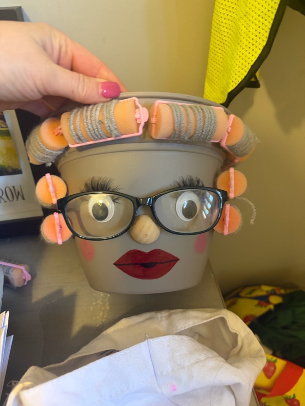 Decorative Face Planter with Pink Hair Rollers and Glasses